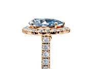Halo Engagement Ring Setting for Fancy Blue Pear-Shaped Center with Narrowing Pave Band and Prong Head in Rose Gold