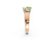 3 Stone Engagement Ring Setting for Fancy Yellow Oval Center with Raised Basket Heads and Prong Head in Rose Gold