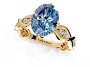 Solitaire Engagement Ring Setting for Fancy Blue Oval Center with Accented Twist Band and Leaf Prong Head in Yellow Gold