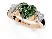 3 Stone Engagement Ring Setting for Fancy Green Heart-Shaped Center with Raised Basket Heads and Prong Head in Rose Gold