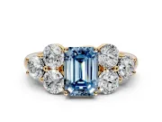 Cluster Engagement Ring Setting for Fancy Blue Emerald Cut Center with Round Cut Accent Frame and Prong Head in Yellow Gold