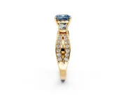 3 Stone Engagement Ring Setting for Fancy Blue Cushion Cut Center with Pave Twist Band and Prong Head in Yellow Gold