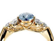 Cluster Engagement Ring Setting for Fancy Blue Pear-Shaped Center with Round Cut Accent Frame and Prong Head in Yellow Gold