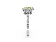 Halo Engagement Ring Setting for Fancy Yellow Pear-Shaped Center with Openwork Halo, Pave Band and Prong Head in Platinum