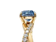 Crossover Engagement Ring Setting for Fancy Blue Cushion Cut Center with Pave and Plain Strands and Prong Head in Yellow Gold