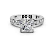 Solitaire Engagement Ring Setting for Princess Cut Center with Channel-Set Accents and Prong Head in Platinum