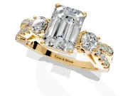 3 Stone Engagement Ring Setting for Emerald Cut Center with Pave Split Shank and Prong Head in Yellow Gold