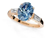 3 Stone Engagement Ring Setting for Fancy Blue Oval Center with Baguette Accents and Prong Head in Rose Gold