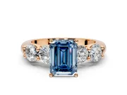 5 Stone Engagement Ring Setting for Fancy Blue Emerald Cut Center with Graduated Accents and Prong Head in Rose Gold