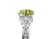 Cluster Engagement Ring Setting for Fancy Yellow Round Cut Center with Bezel Accent Clusters and Prong Head in Platinum