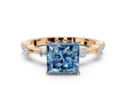 Solitaire Engagement Ring Setting for Fancy Blue Princess Cut Center with Bezel Station Band and Prong Head in Rose Gold