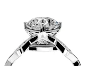 Solitaire Engagement Ring Setting for Round Cut Center with Accented Twist Band and Leaf Prong Head in Platinum