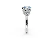 Leaf Cluster Engagement Ring Setting for Fancy Blue Pear-Shaped Center with Marquise Accents and Prong Head in Platinum