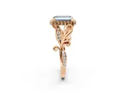 Halo Engagement Ring Setting for Fancy Blue Emerald Cut Center with Leaf Motif Split Shank and Prong Head in Rose Gold