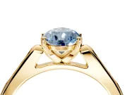 Solitaire Engagement Ring Setting for Fancy Blue Pear-Shaped Center with Channel Accents and Prong Head in Yellow Gold