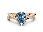 Crossover Engagement Ring Setting for Fancy Blue Pear-Shaped Center with Pave and Plain Strands and Prong Head in Rose Gold