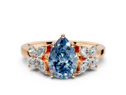 Floral Engagement Ring Setting for Fancy Blue Pear-Shaped Center with Marquise Cluster Shoulders and Prong Head in Rose Gold