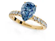 Open Basket Engagement Ring Setting for Fancy Blue Pear-Shaped Center with Pave Band and Prong Head in Yellow Gold