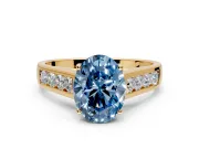 Solitaire Engagement Ring Setting for Fancy Blue Oval Center with Cathedral Channel Band and Prong Head in Yellow Gold