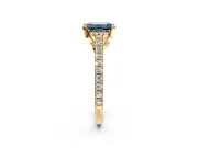 Solitaire Engagement Ring Setting for Fancy Blue Emerald Cut Center with Widening Pave Band and Claw Prong Head in Yellow Gold