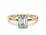 Low-Set Solitaire Engagement Ring Setting for Emerald Cut Center with Thin Plain Band and Prong Head in Yellow Gold