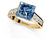 Solitaire Engagement Ring Setting for Fancy Blue Princess Cut Center with Cathedral Channel Band and Prong Head in Yellow Gold