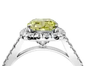 Halo Engagement Ring Setting for Fancy Yellow Cushion Cut Center with Narrowing Pave Band and Prong Head in Platinum