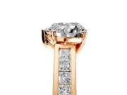 Solitaire Engagement Ring Setting for Heart-Shaped Center with Princess Cut Channel Band and Prong Head in Rose Gold