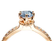 Solitaire Engagement Ring Setting for Fancy Blue Pear-Shaped Center with Raised Channel Band and Prong Head in Rose Gold