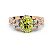 Cluster Engagement Ring Setting for Fancy Yellow Oval Center with Bezel Accent Clusters and Prong Head in Rose Gold