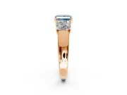 3 Stone Engagement Ring Setting for Fancy Blue Princess Cut Center with Raised Basket Heads and Prong Head in Rose Gold