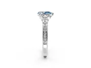 Cluster Engagement Ring Setting for Fancy Blue Pear-Shaped Center with Bezel Accent Clusters and Prong Head in Sterling Silver