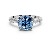 Solitaire Engagement Ring Setting for Fancy Blue Round Cut Center with Trailing Leaf Accent Band and Prong Head in Sterling Silver