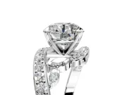 Solitaire Engagement Ring Setting for Round Cut Center with Pave Bypass Twist Band and Prong Head in Platinum