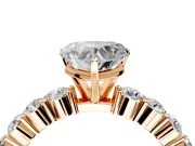 Shared-Prong Engagement Ring Setting for Heart-Shaped Center with Graduated Accents and Prong Head in Rose Gold