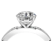 Solitaire Engagement Ring Setting for Round Cut Center with Milgrain-Edged Pave Band and Prong Head in White Gold