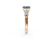 5 Stone Engagement Ring Setting for Fancy Blue Radiant Cut Center with Graduated Accents and Prong Head in Rose Gold