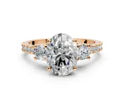 3 Stone Engagement Ring Setting for Oval Center with Round Cut Side Accents and Prong Head in Rose Gold