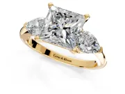 3 Stone Engagement Ring Setting for Princess Cut Center with Large Pear-Shaped Accents and Prong Head in Yellow Gold