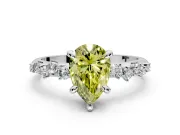 Solitaire Engagement Ring Setting for Fancy Yellow Pear-Shaped Center with Trailing Leaf Accent Band and Prong Head in Sterling Silver