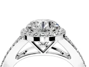 Halo Engagement Ring Setting for Round Cut Center with Pave Split Shank and Prong Head in White Gold