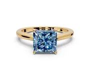 Solitaire Engagement Ring Setting for Fancy Blue Princess Cut Center with Narrow Cathedral Band and Prong Head in Yellow Gold
