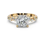 Solitaire Engagement Ring Setting for Cushion Cut Center with Trailing Leaf Accent Band and Prong Head in Yellow Gold