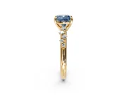 Solitaire Engagement Ring Setting for Fancy Blue Cushion Cut Center with Trailing Leaf Accent Band and Prong Head in Yellow Gold