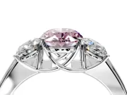 3 Stone Engagement Ring Setting for Fancy Pink Oval Center with Raised Basket Heads and Prong Head in Platinum