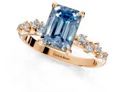 Solitaire Engagement Ring Setting for Fancy Blue Emerald Cut Center with Trailing Leaf Accent Band and Prong Head in Rose Gold