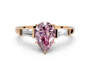 3 Stone Engagement Ring Setting for Fancy Pink Pear-Shaped Center with Channel Baguette Accents and Prong Head in Rose Gold