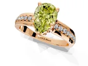 Solitaire Engagement Ring Setting for Fancy Yellow Pear-Shaped Center with Raised Channel Band and Prong Head in Rose Gold