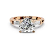 3 Stone Engagement Ring Setting for Heart-Shaped Center with Channel Baguette Accents and Prong Head in Rose Gold