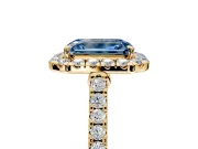 Halo Engagement Ring Setting for Fancy Blue Emerald Cut Center with Narrowing Pave Band and Prong Head in Yellow Gold